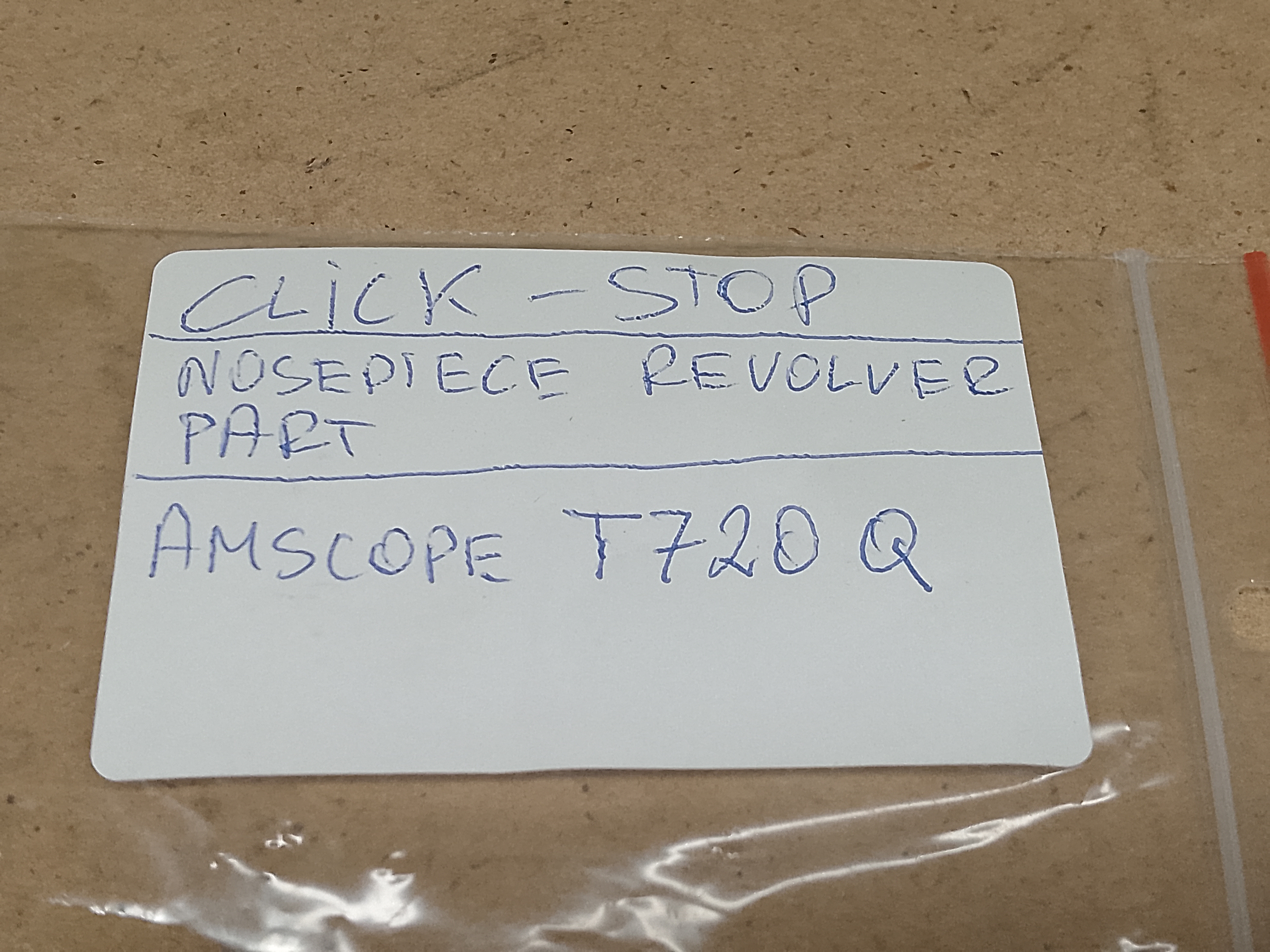 Zapadka (sprężyna) "click-stop" do rewolweru obiektywowego mikroskopu AmScope T720Q - ujęcie #2