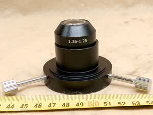 AmScope T490 DK-OIL120 - mikroskopowy olejowy kondensor ciemnego pola z N.A. 1,25 - 1,36 o średnicy 37 mm - different 1 view